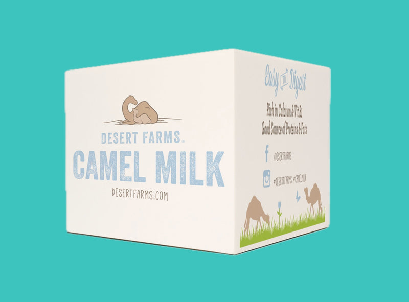 Box of Desert Farms camel milk on a teal background