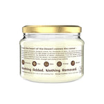 Jar with a gold lid and white label on a white background