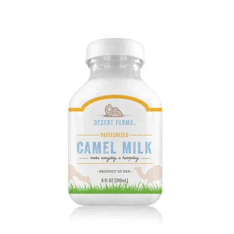Bottle of Desert Farms pasteurized camel milk on a white background